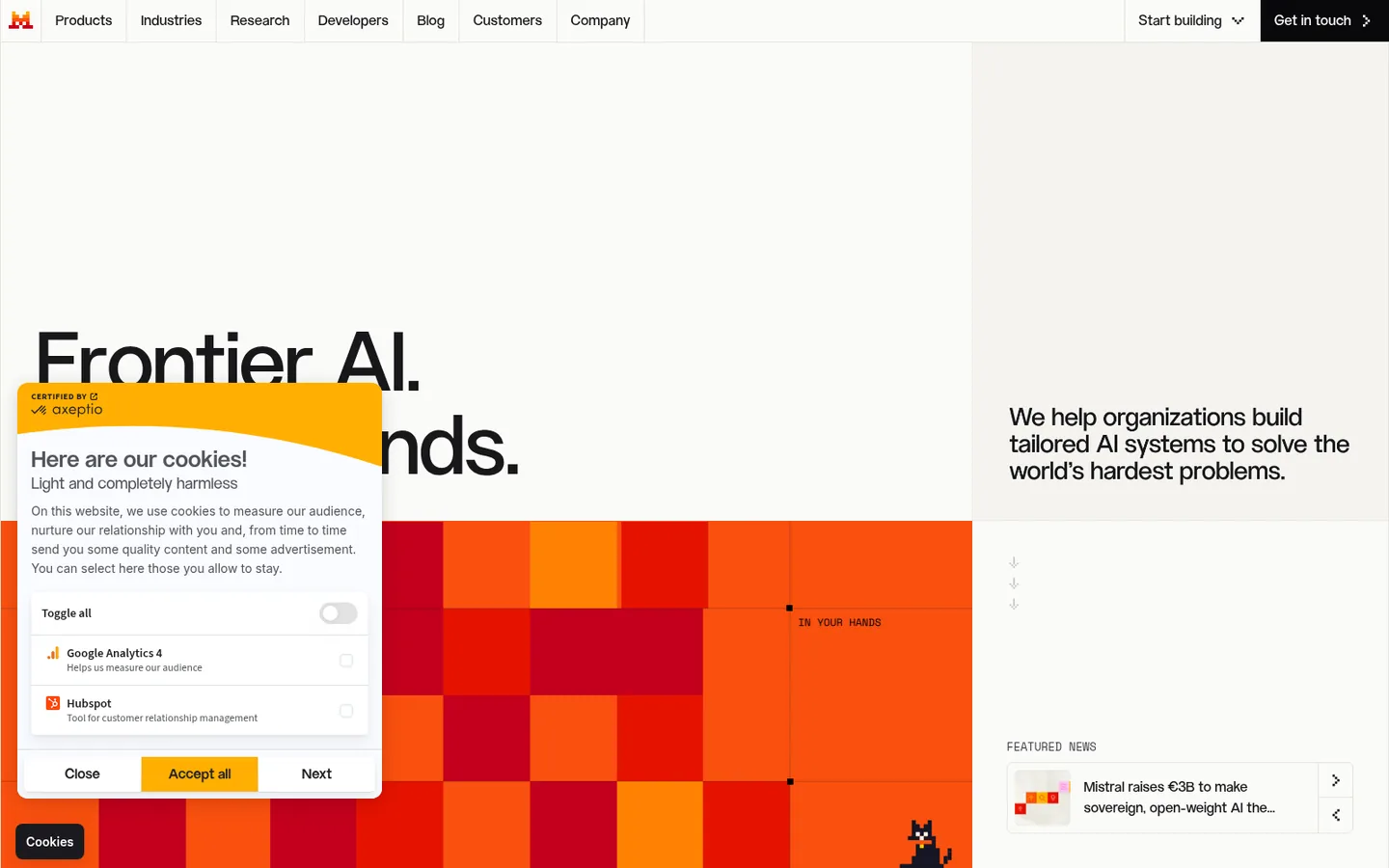 Mistral AI home page — the Frontier AI headline with the brand's orange graphic